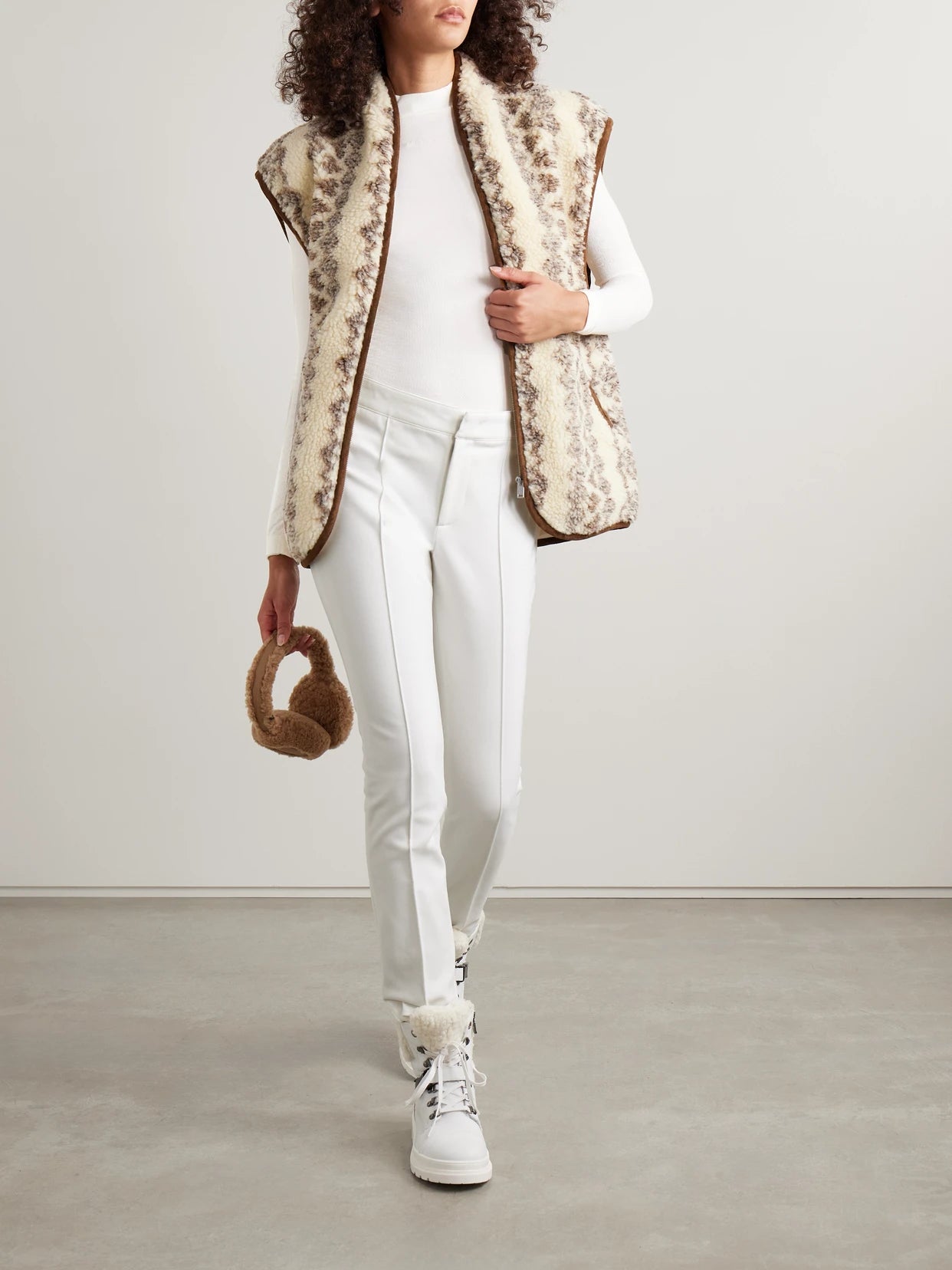 Image of a model wearing Tops. Product name - Nordic Wool-blend Top in White colour by brand - FALKE Ergonomic Sport System