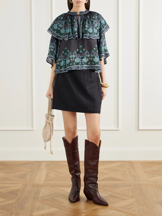Image of a model wearing Tops. Product name - Tulla Cape-detailed Printed Habotai Blouse in Navy colour by brand - Sea