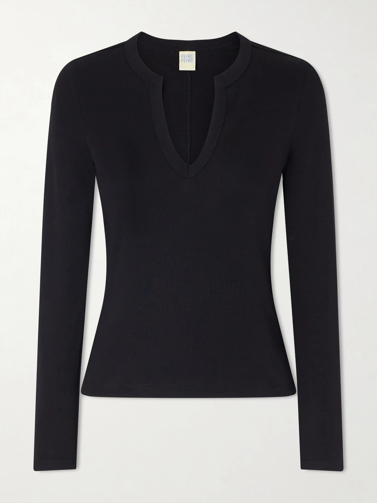 Image of a model wearing Tops. Product name - Iman Organic Cotton-jersey T-shirt in Black colour by brand - FLORE FLORE