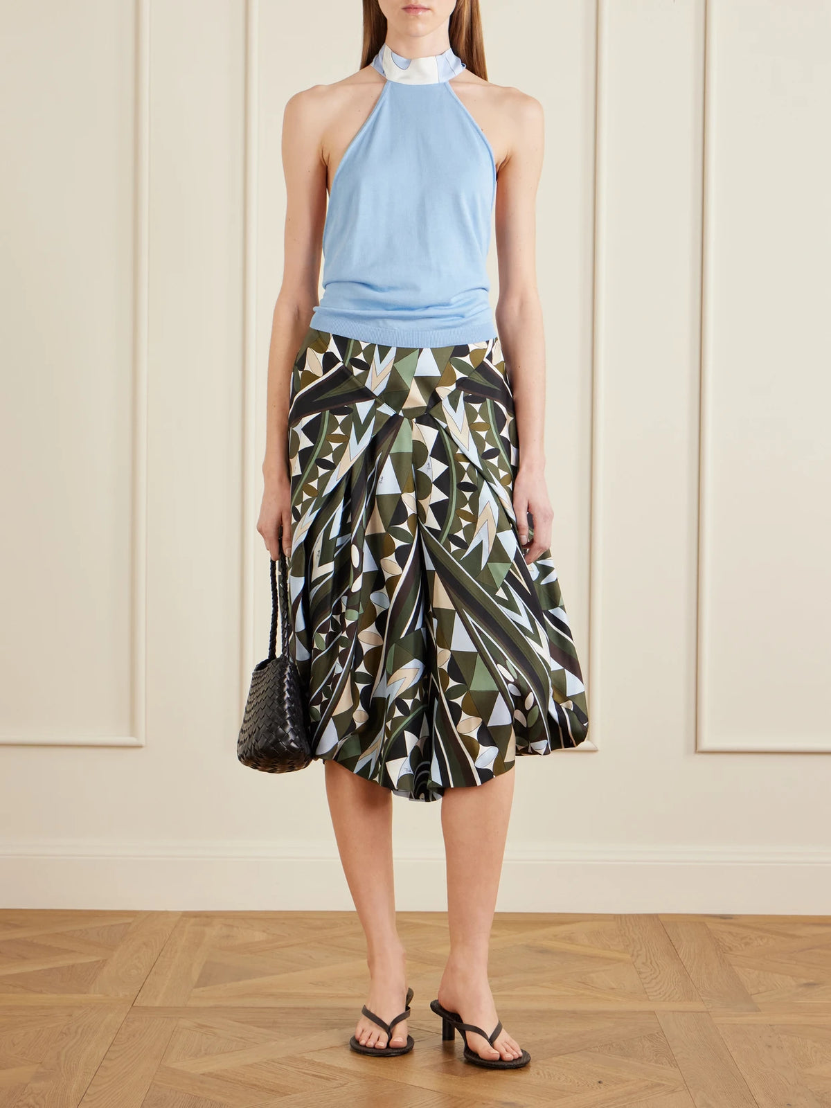 Image of a model wearing Pants. Product name - Printed Silk-twill Wide-leg Pants in Army green colour by brand - PUCCI