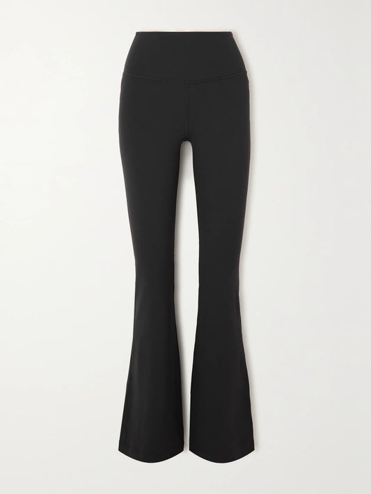 Image of a model wearing Pants. Product name - Groove Stretch Flared Pants in Black colour by brand - lululemon