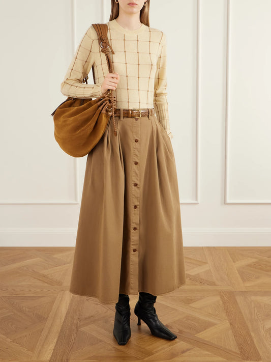 Image of a model wearing Outerwear. Product name - Checked Cashmere Sweater in Yellow colour by brand - Guest In Residence
