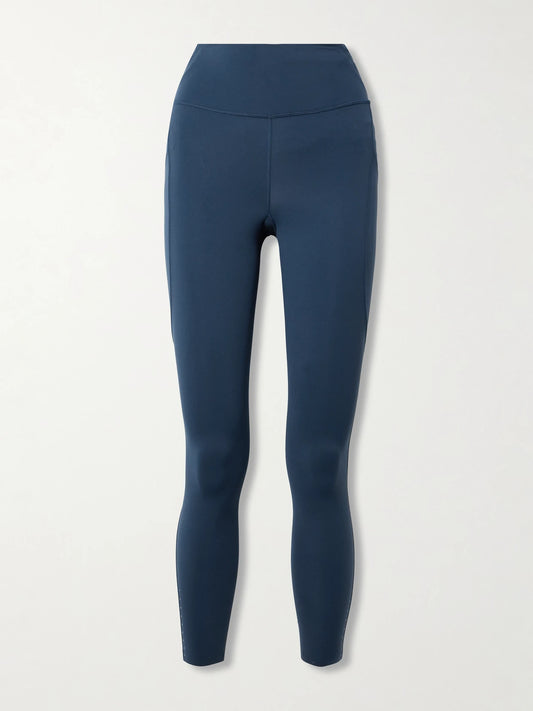 Image of a model wearing Pants. Product name - Fast And Free 25" Nulux High-rise Leggings in Navy colour by brand - lululemon