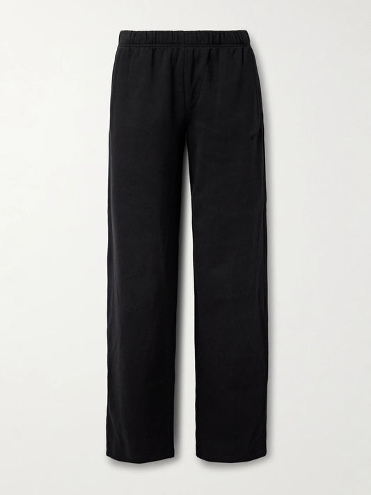 Image of Sleepwear & Loungewear. Product name - Classic Cotton-blend Jersey Straight-leg Pants - Onyx in Black colour by brand - SKIMS