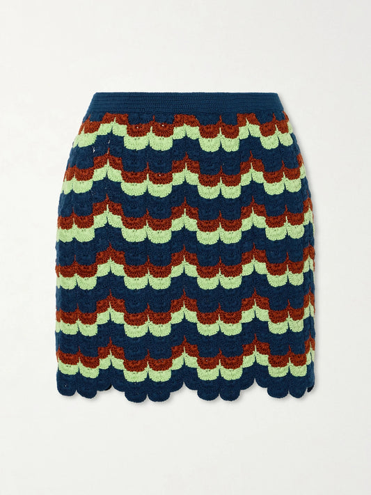 Image of a model wearing Skirts. Product name - Alba Crocheted Cotton Mini Skirt in Blue colour by brand - ESCVDO