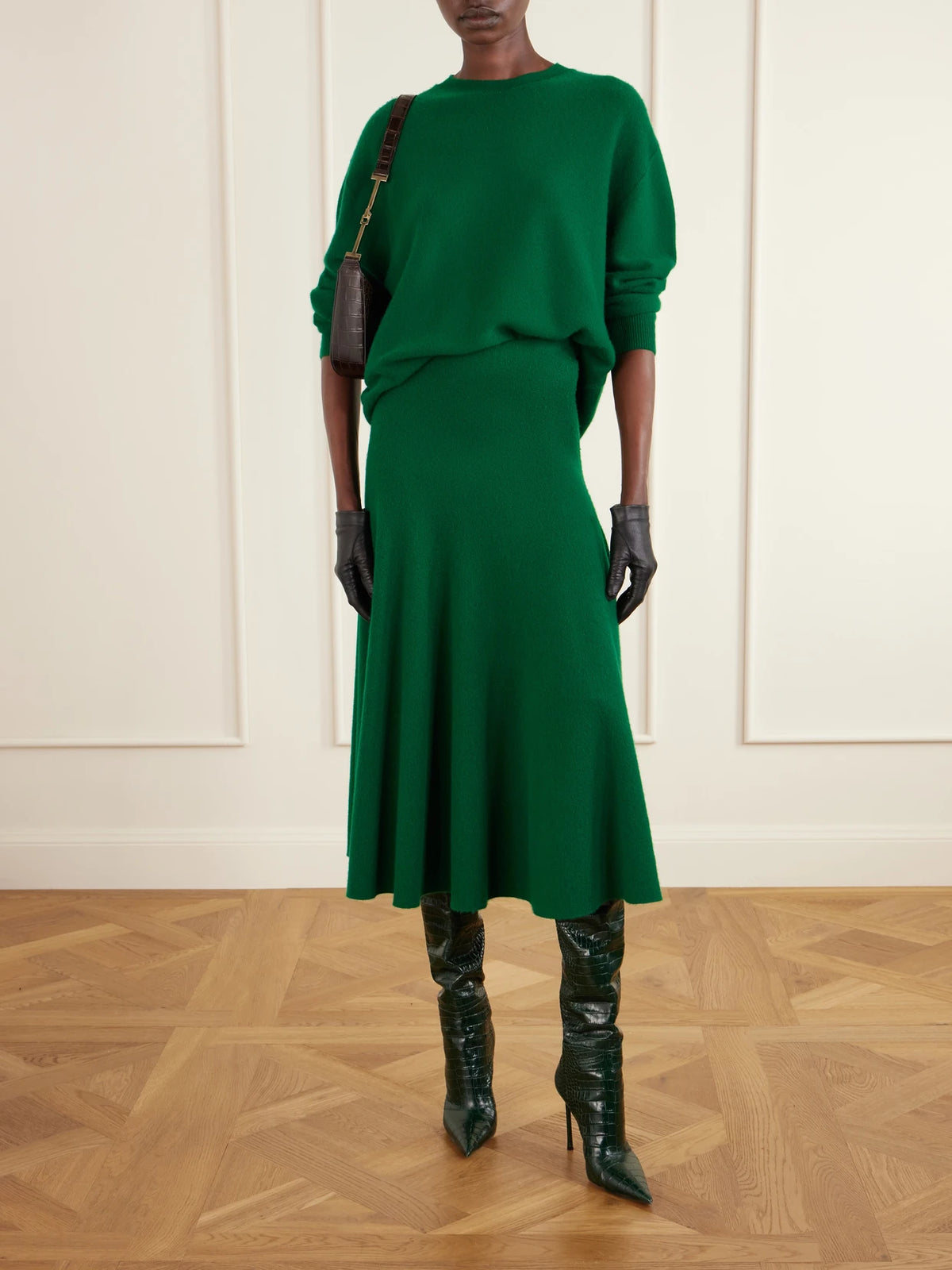Image of a model wearing Skirts. Product name - Cashmere Midi Skirt in Green colour by brand - TOM FORD