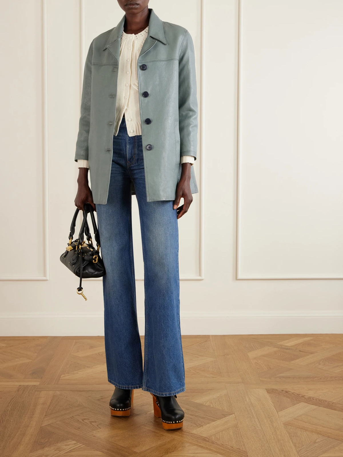 Image of Coats & Jackets. Product name - Paneled Leather Jacket in Light blue colour by brand - Chloé
