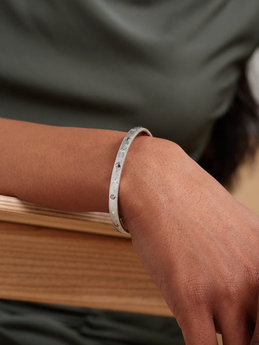 Image of Bracelets. Product name - Talisman 18-karat White Gold Diamond Bangle in Multi colour by brand - De Beers London