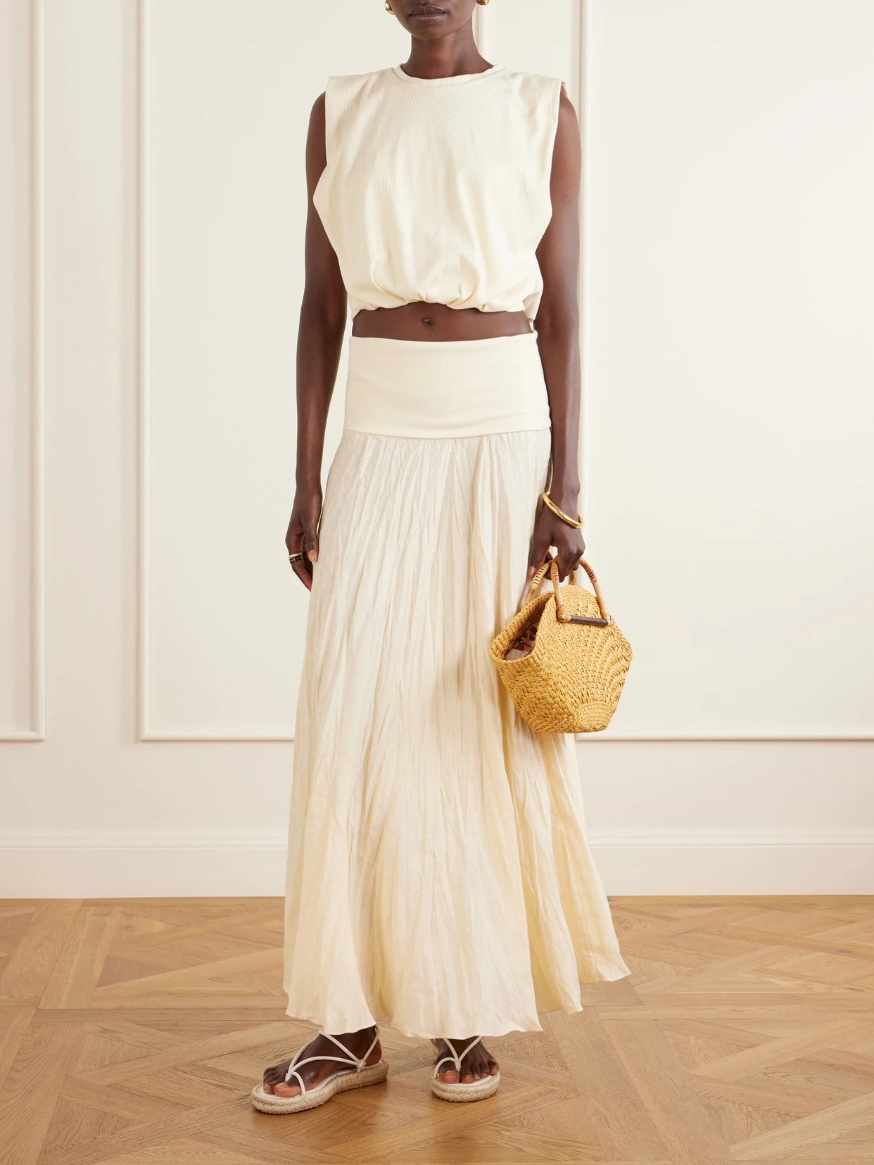 Image of a model wearing Skirts. Product name - Light And Sound Linen-blend Jersey Maxi Skirt in Ecru colour by brand - Johanna Ortiz