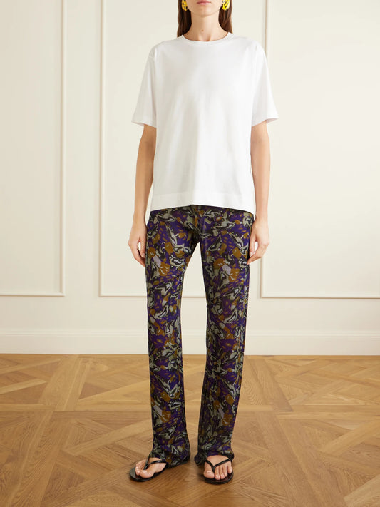 Image of a model wearing Tops. Product name - Cotton-jersey T-shirt in White colour by brand - Dries Van Noten
