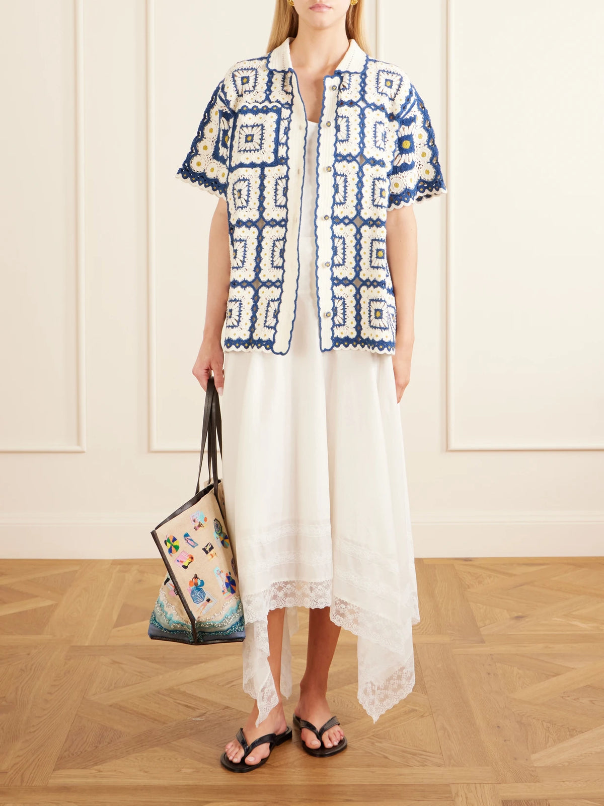 Image of a model wearing Skirts. Product name - Ainsley Asymmetric Lace-trimmed Cotton-voile Maxi Skirt in Ivory colour by brand - STAUD