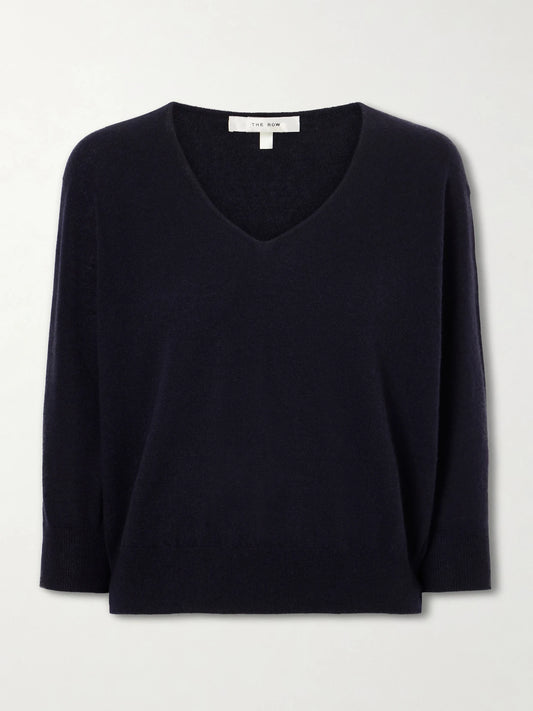 Image of a model wearing Outerwear. Product name - Orchidea Cashmere Knit Sweater in Navy colour by brand - The Row