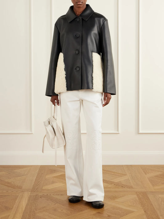 Image of Coats & Jackets. Product name - Shearling-trimmed Leather Jacket in Black colour by brand - LOEWE