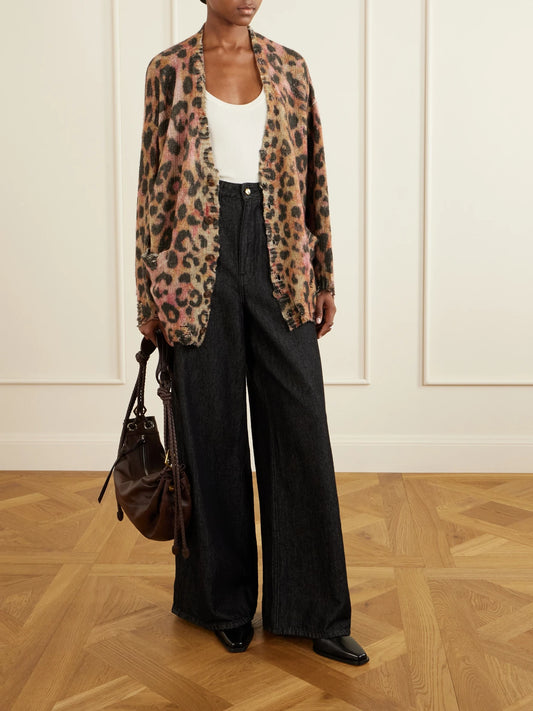 Image of a model wearing Outerwear. Product name - Distressed Animal-print Cashmere Cardigan in Brown colour by brand - R13