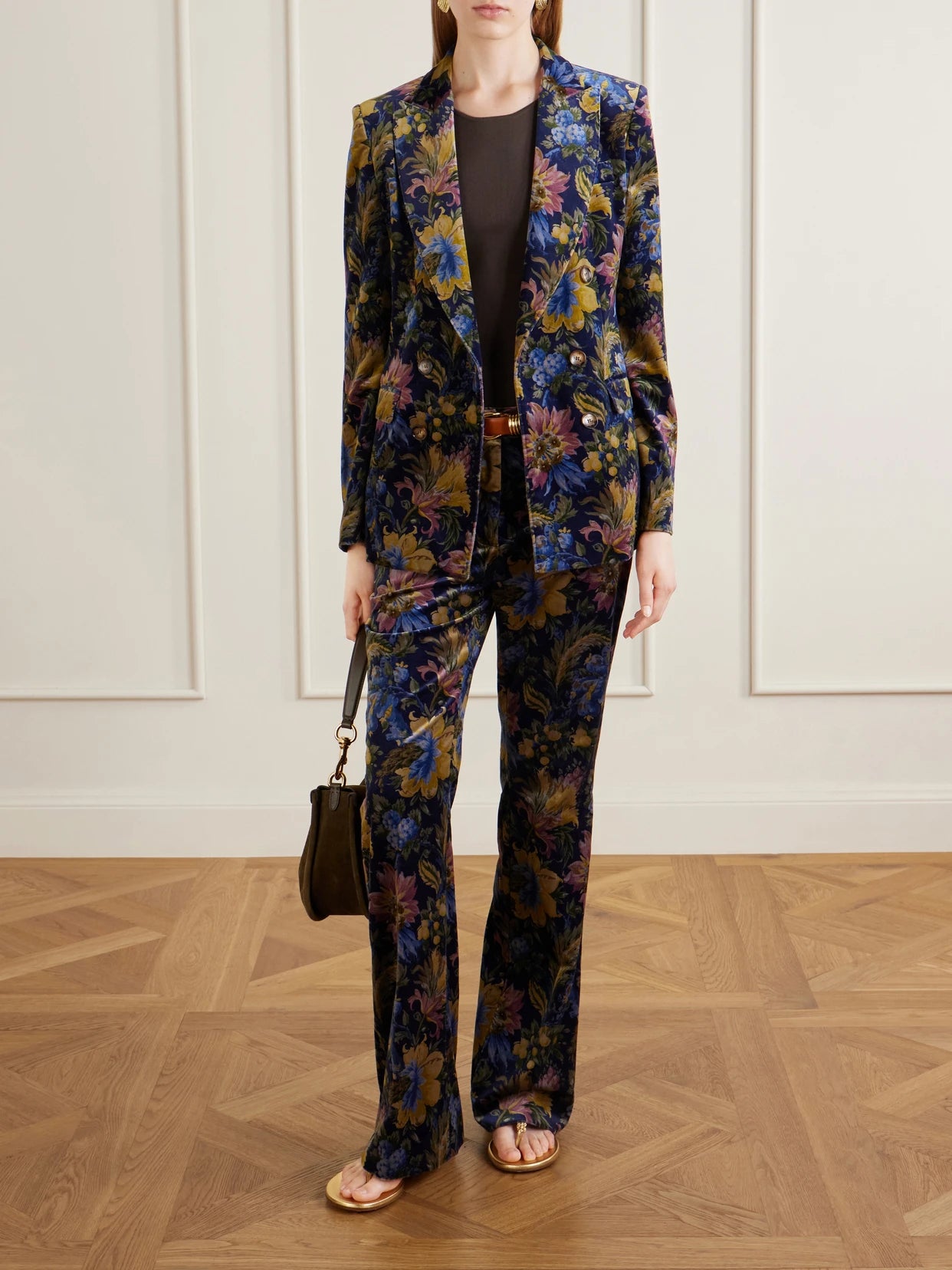Image of a model wearing Pants. Product name - Printed Cotton-blend Velvet Flared Pants in Navy colour by brand - Etro
