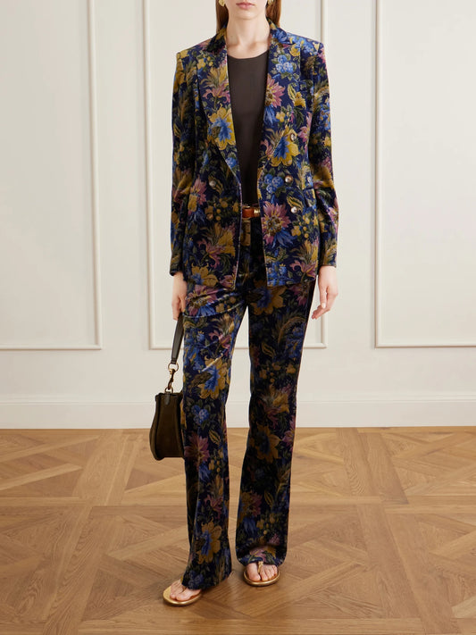 Image of a model wearing Pants. Product name - Printed Cotton-blend Velvet Flared Pants in Navy colour by brand - Etro