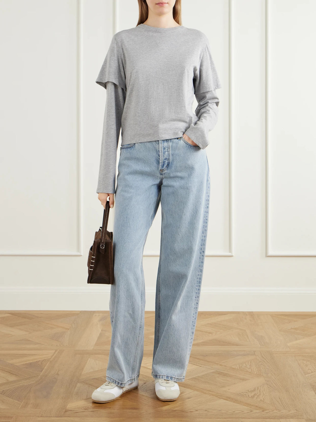 Image of a model wearing Tops. Product name - 2tee Layered Cotton-jersey T-shirt in Gray colour by brand - Still Here