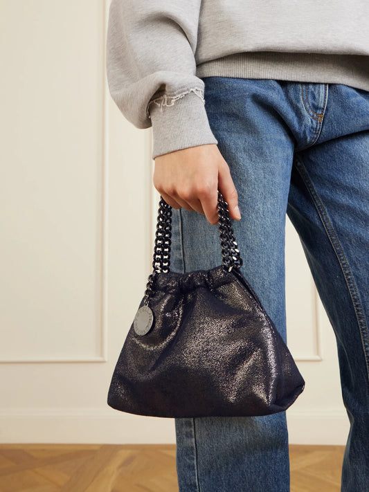 Image of Bags. Product name - Falabella Mini Metallic Vegetarian Suede Drawstring Bag in Navy colour by brand - Stella McCartney