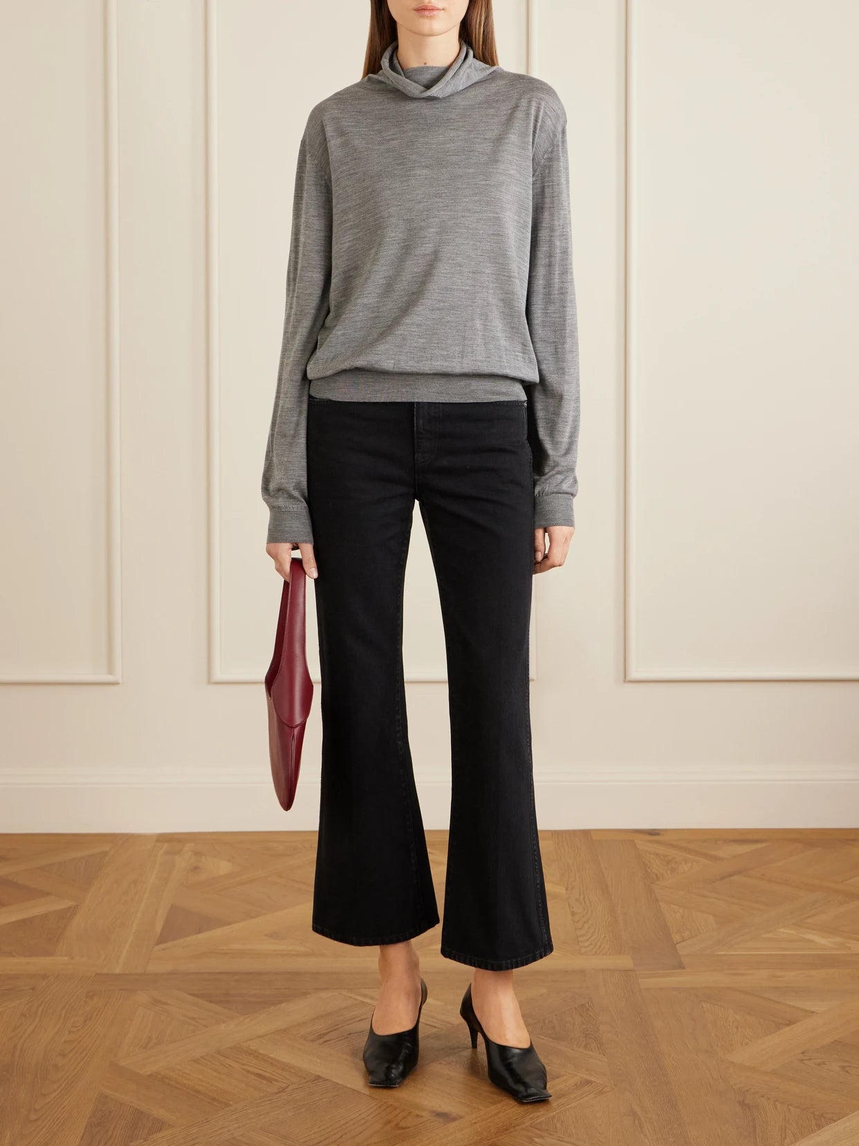 Image of Jeans. Product name - Clara Flared Jeans in Black colour by brand - KHAITE