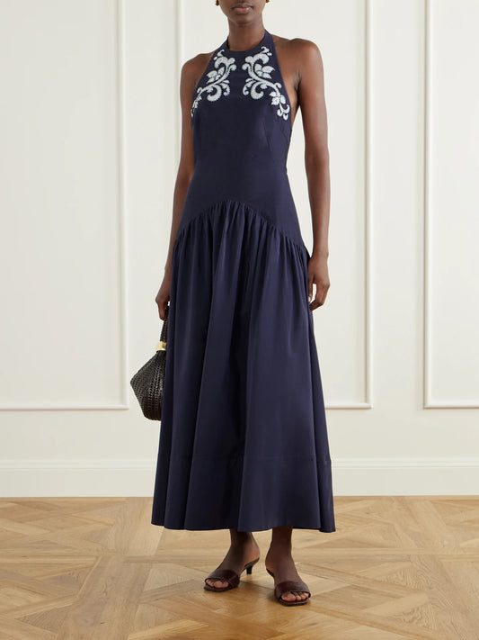 Image of Dresses. Product name - Dillon Crystal-embellished Appliquéd Embroidered Cotton-blend Poplin Halterneck Maxi Dress in Midnight blue colour by brand - ALÉMAIS