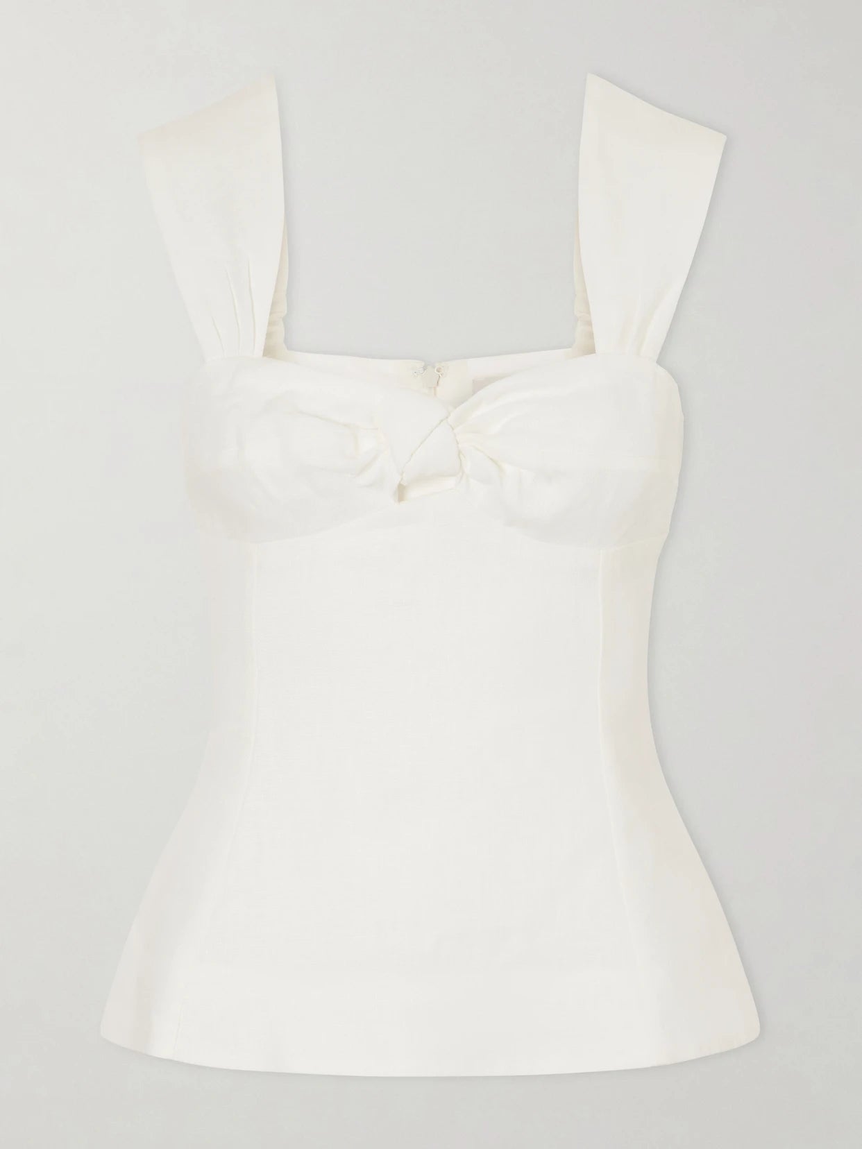 Image of a model wearing Tops. Product name - Pallida Linen Top in White colour by brand - Faithfull