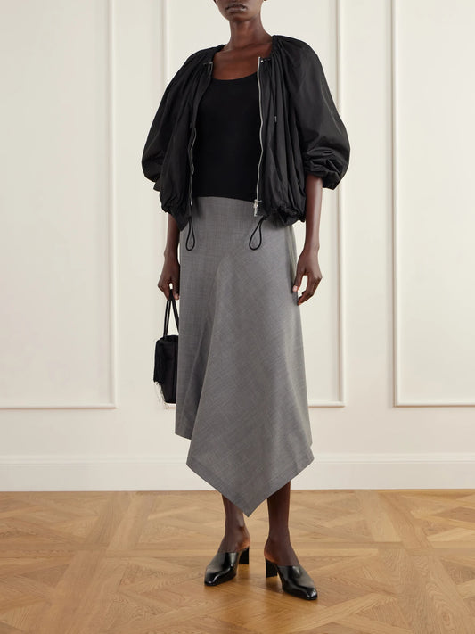 Image of a model wearing Tops. Product name - Ribbed Merino Wool Tank in Black colour by brand - ST. AGNI