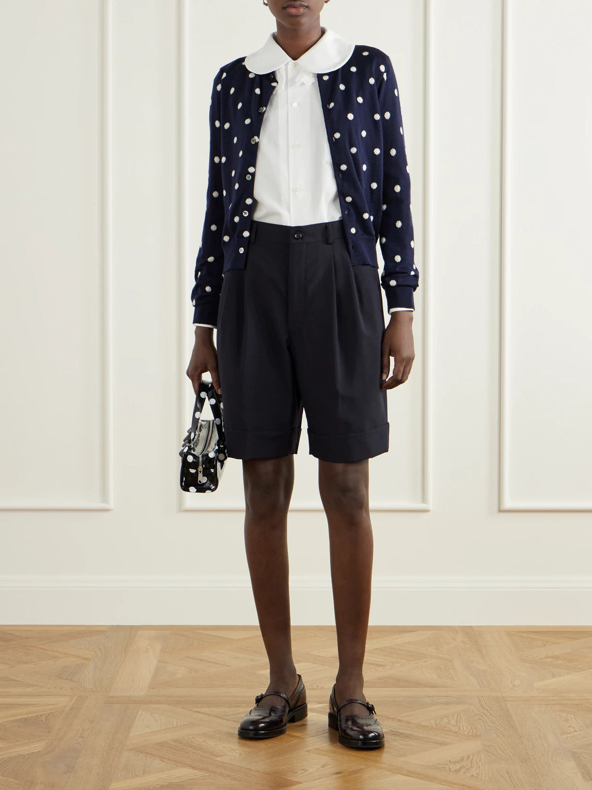Image of a model wearing Tops. Product name - Broderie Anglaise-trimmed Cotton-poplin Blouse in White colour by brand - Comme des Garçons GIRL