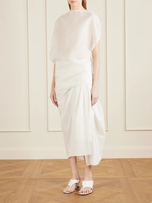 Image of a model wearing Tops. Product name - Poppi Cotton And Silk-blend Blouse in Off-white colour by brand - KHAITE