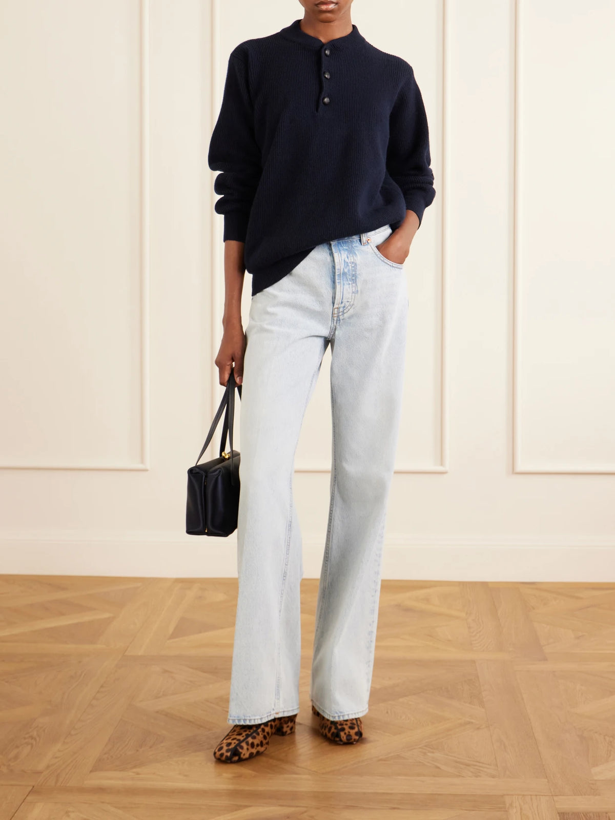 Image of a model wearing Outerwear. Product name - Highland Dorset Ribbed-knit Wool And Cashmere-blend Sweater in Navy colour by brand - BLAZÉ Milano