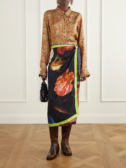 Image of a model wearing Skirts. Product name - Floral-print Silk-satin Wrap Midi Skirt in Multi colour by brand - Dries Van Noten