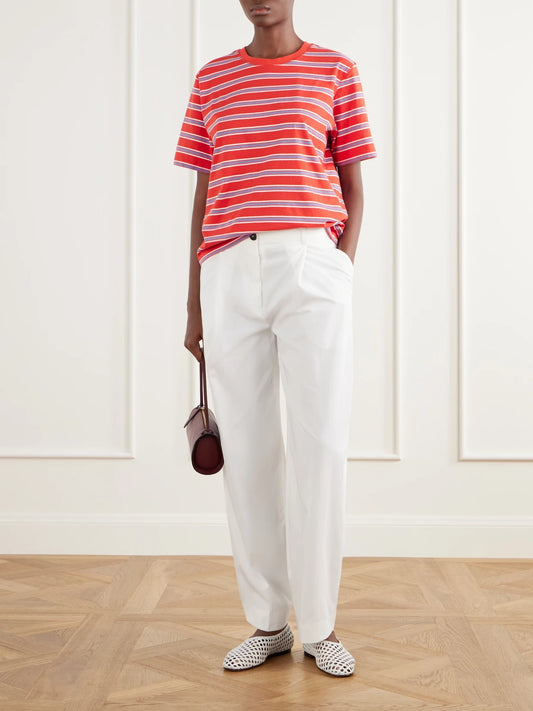 Image of a model wearing Tops. Product name - Boyfriend Striped Cotton-jersey T-shirt in Red colour by brand - La Ligne