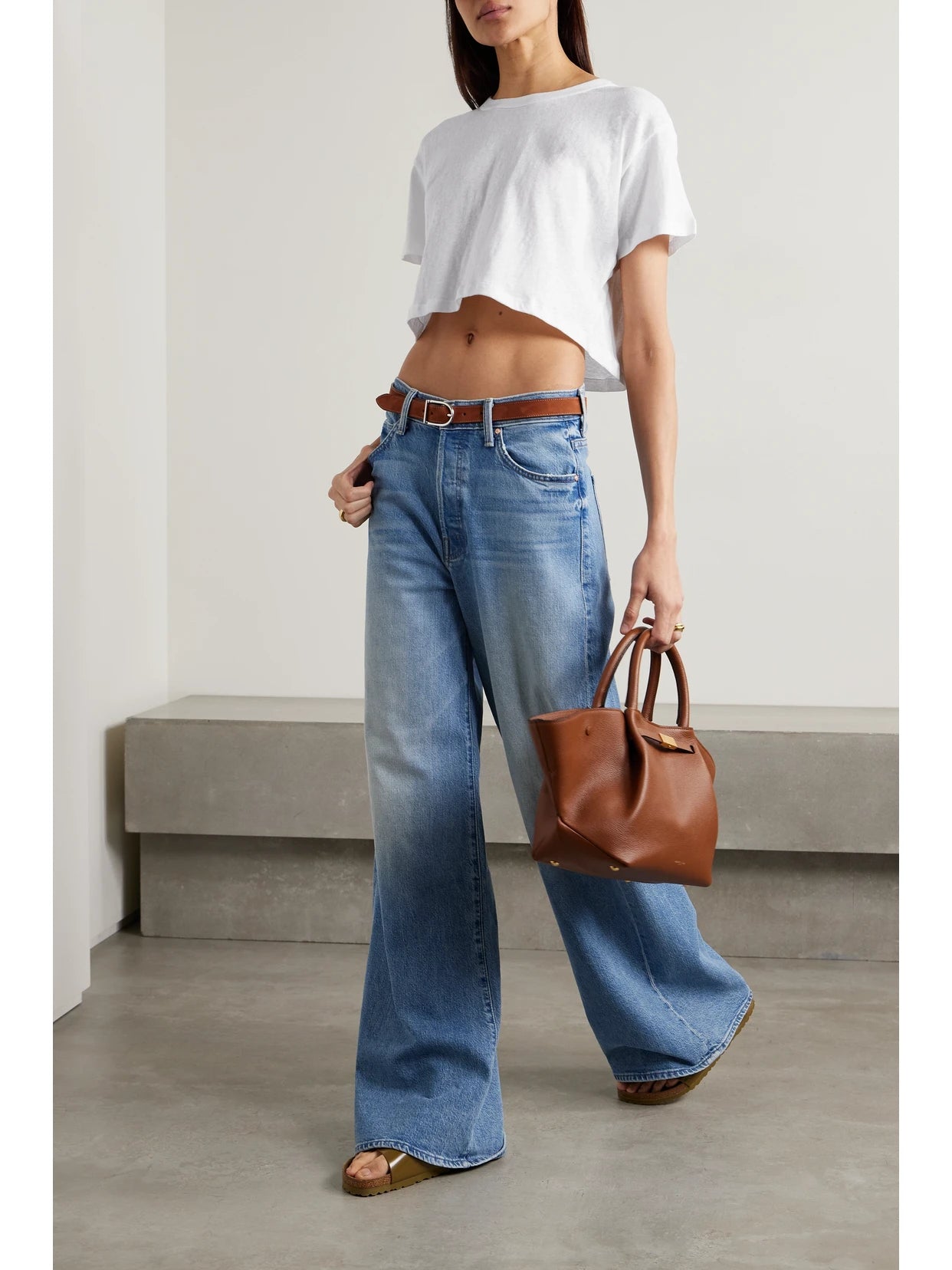 Image of a model wearing Tops. Product name - Cropped Slub Cotton-jersey T-shirt in White colour by brand - LESET