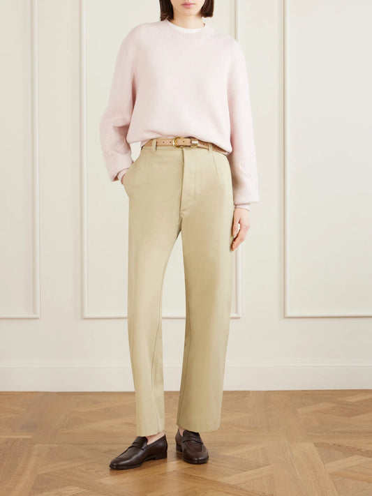 Image of a model wearing Outerwear. Product name - Embroidered Cashmere Sweater in Baby pink colour by brand - Loro Piana
