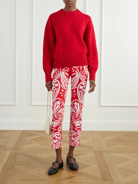 Image of a model wearing Pants. Product name - Cosmic Paisley Kick Cotton-blend Jacquard Flared Pants in large colour by brand - HIGH SPORT