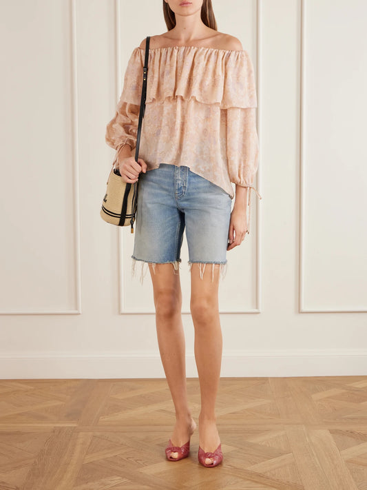 Image of a model wearing Tops. Product name - Off-the-shoulder Ruffled Floral-print Silk-charmeuse Blouse in Pink colour by brand - Chloé