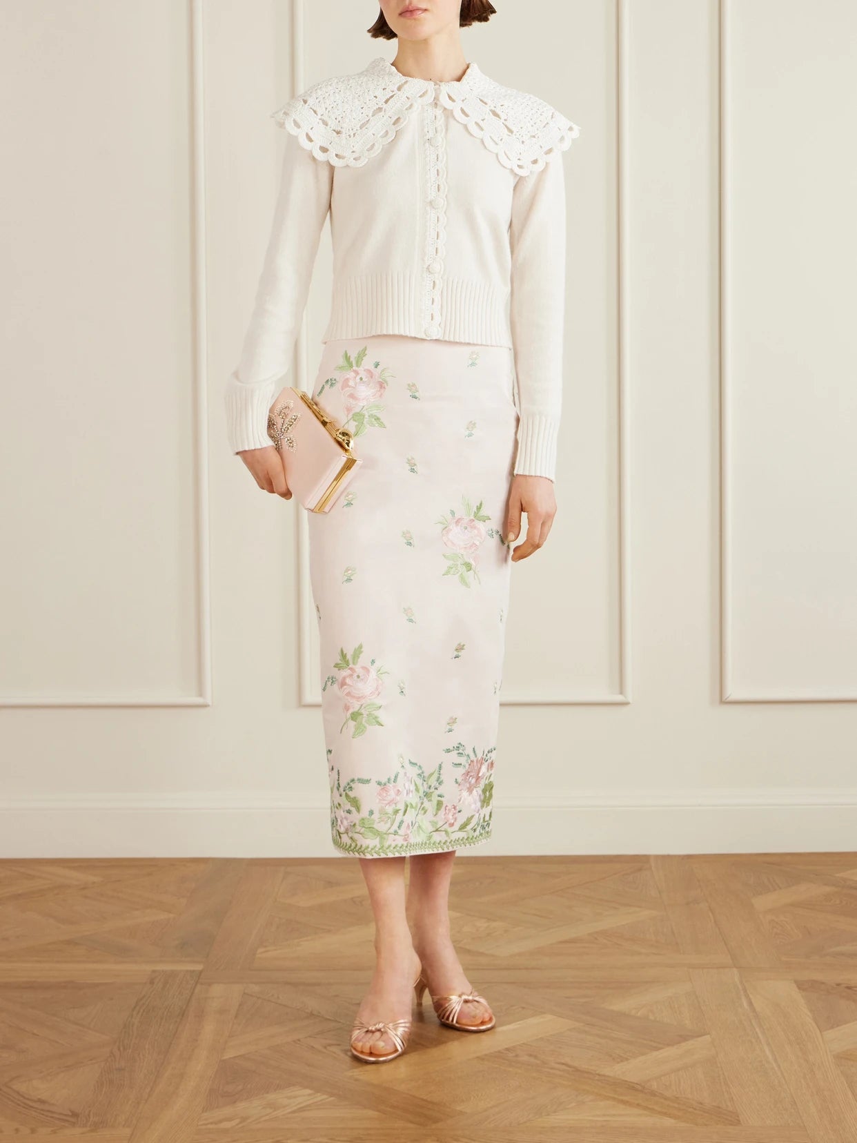 Image of a model wearing Skirts. Product name - Floral-embroidered Cotton-faille Midi Skirt in Pink colour by brand - Erdem