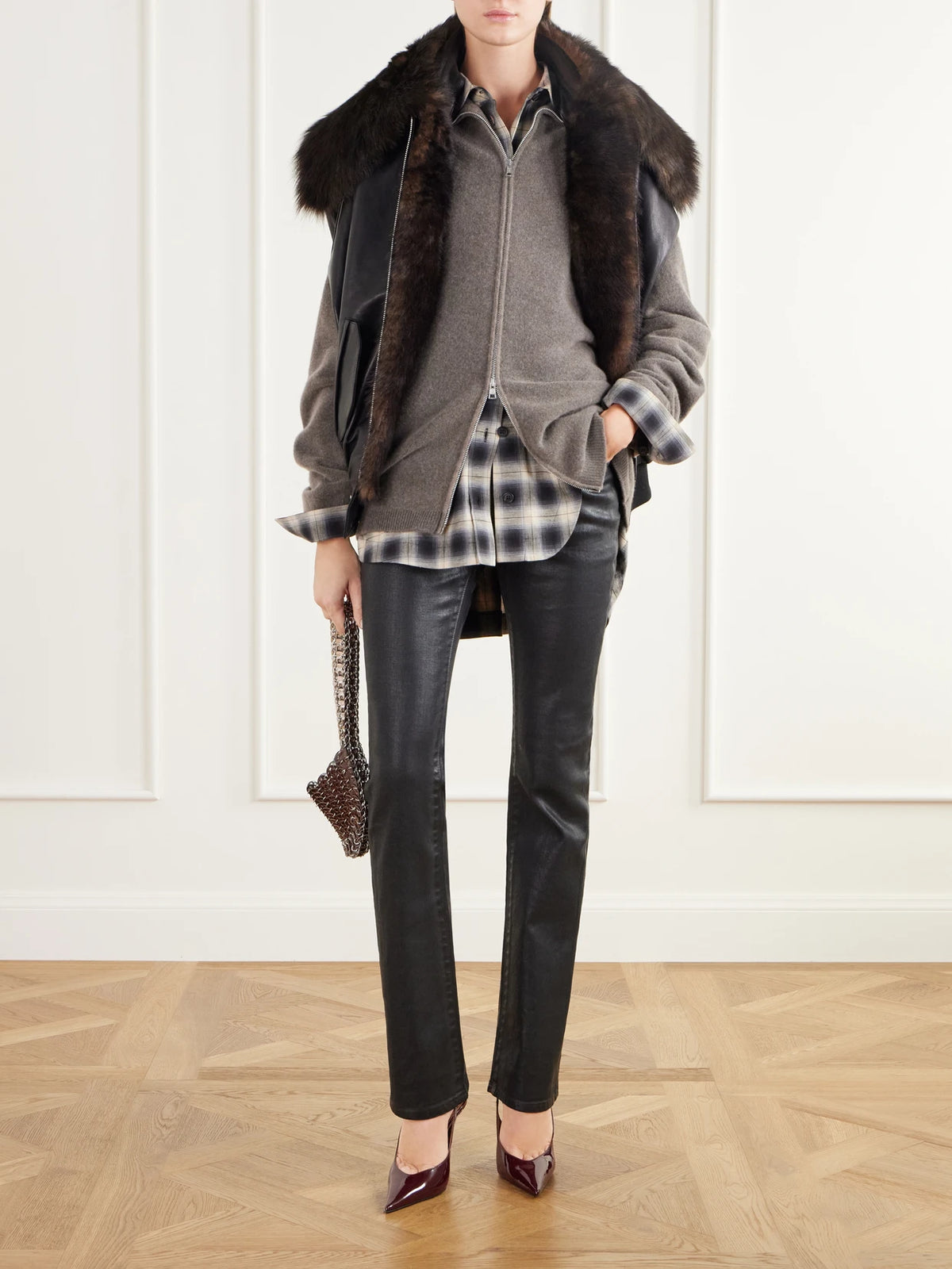 Image of Coats & Jackets. Product name - Shearling-trimmed Leather Jacket in Black colour by brand - RABANNE
