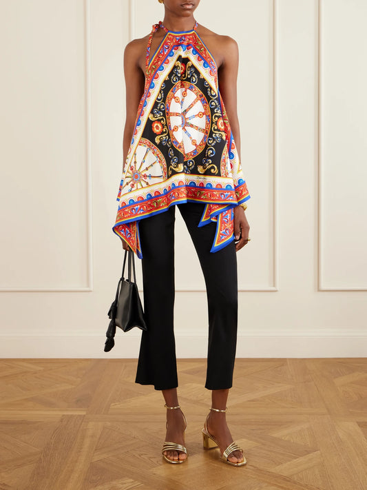 Image of a model wearing Tops. Product name - Carretto Printed Halterneck Satin Top in Red colour by brand - Dolce & Gabbana