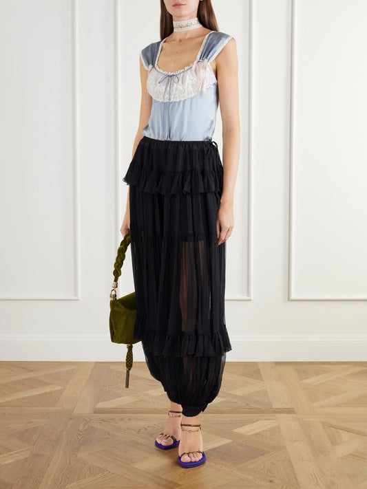 Image of a model wearing Tops. Product name - Bow-detailed Lace-trimmed Silk-satin Cami in Light blue colour by brand - Chloé