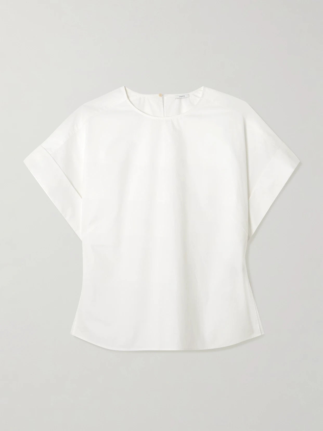Image of a model wearing Tops. Product name - Fassia Cotton-poplin Blouse in White colour by brand - Joseph