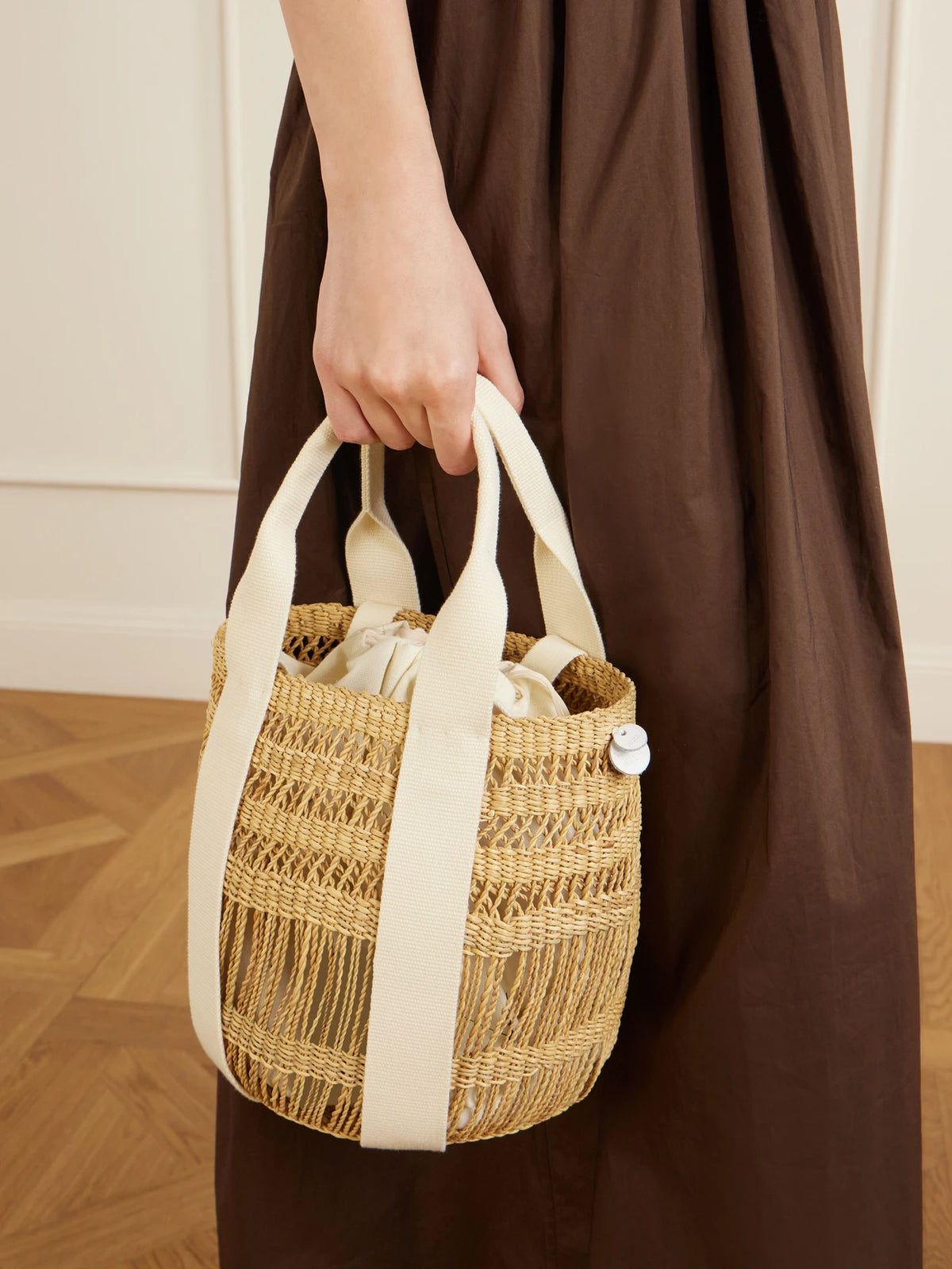 Image of Bags. Product name - Mixy Raffia Bucket Bag in Neutral colour by brand - MUUÑ