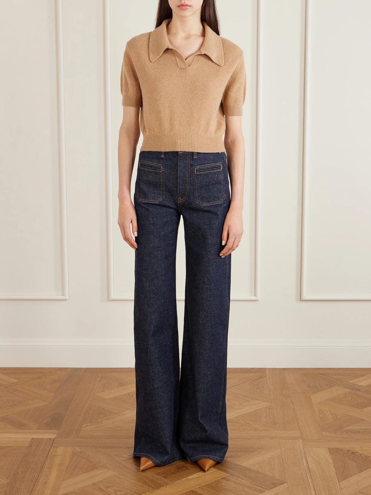 Image of a model wearing Outerwear. Product name - Leni Cropped Wool And Cashmere-blend Sweater in Camel colour by brand - KHAITE