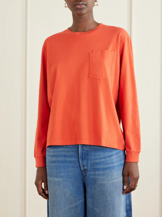Image of a model wearing Tops. Product name - Double Pocket-detail Cotton T-shirt in Red colour by brand - B SIDES