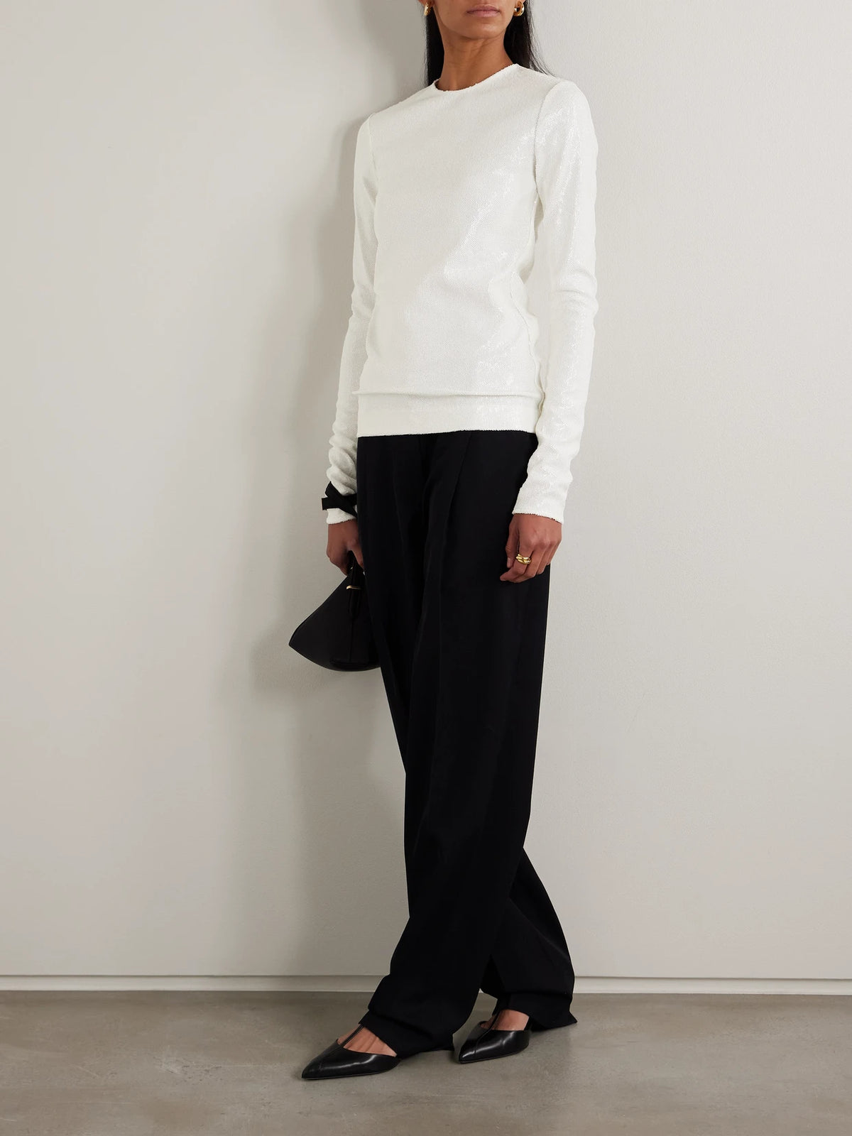 Image of a model wearing Tops. Product name - Sequined Mesh Top in White colour by brand - TOTEME