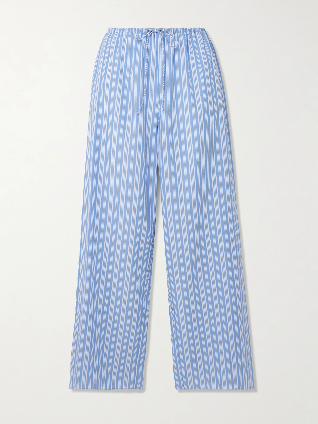 Image of a model wearing Pants. Product name - Lavona Striped Organic Cotton Straight-leg Pants in Blue colour by brand - DÔEN