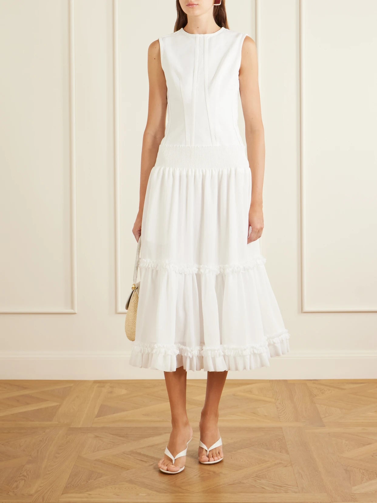 Image of a model wearing Skirts. Product name - Ruffled Poplin Maxi Skirt in White colour by brand - Balmain