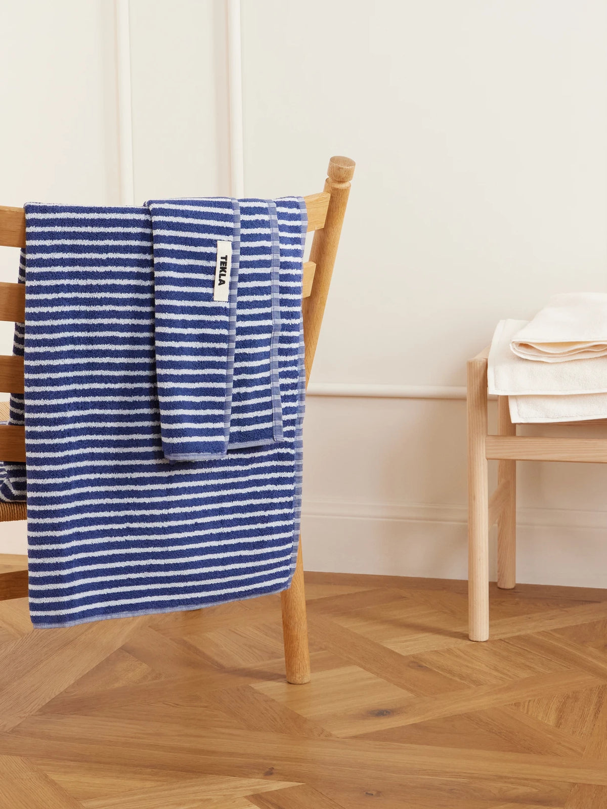 Image of Towels. Product name - Set Of Three Striped Organic Cotton-terry Towels in Blue colour by brand - TEKLA