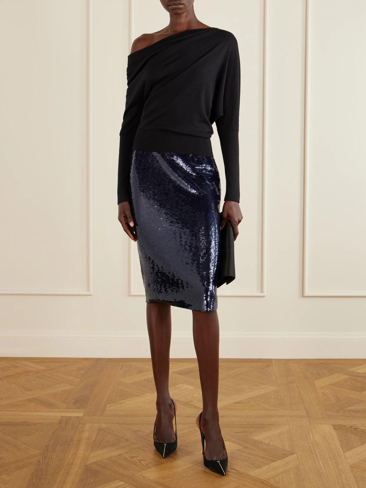 Image of a model wearing Skirts. Product name - Sequined Tulle Midi Skirt in Navy colour by brand - TOM FORD