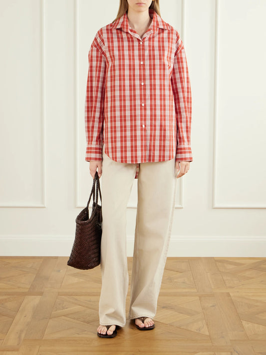 Image of a model wearing Tops. Product name - En Vau Checked Cotton Shirt in Red colour by brand - Faithfull