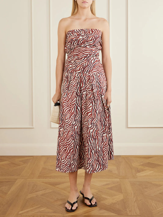 Image of a model wearing Tops. Product name - Maisy Strapless Printed Cotton-blend Poplin Top in Red colour by brand - Proenza Schouler White Label